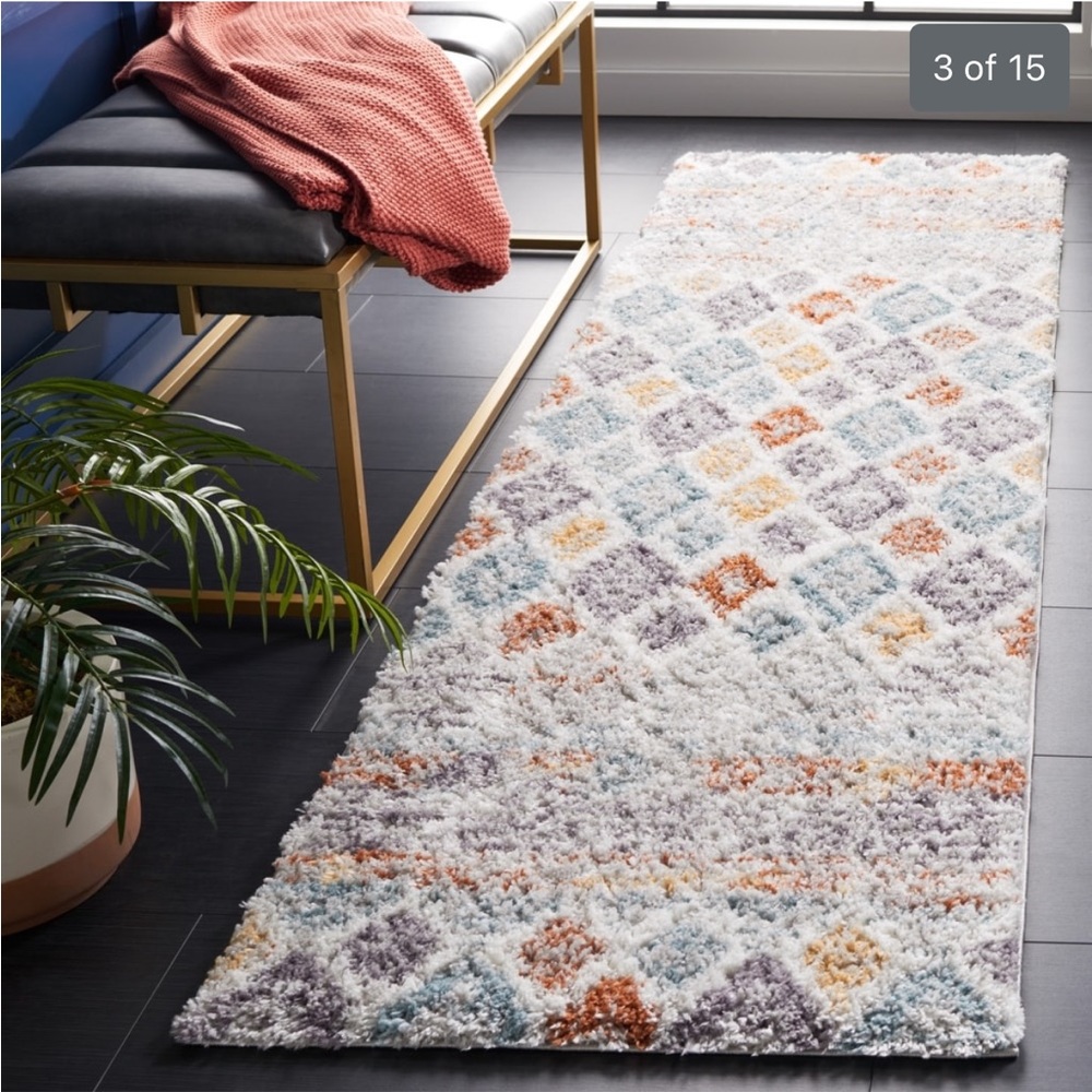 2' 3" x 10' carpet runner, very pretty color new and didnt use it,